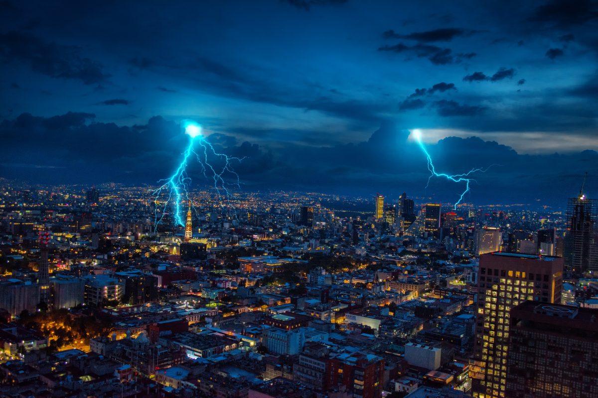 lighting affecting a city during a storm