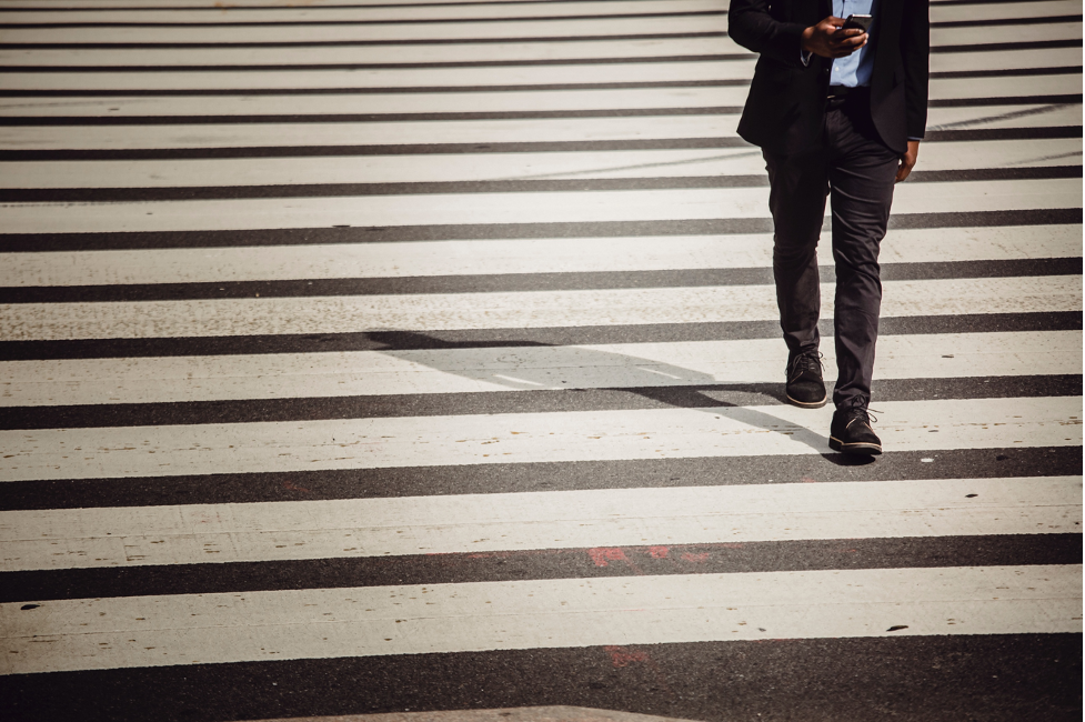 Man walking along the pedestrian lane