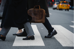 corporate workers walking along the pedestrian lane